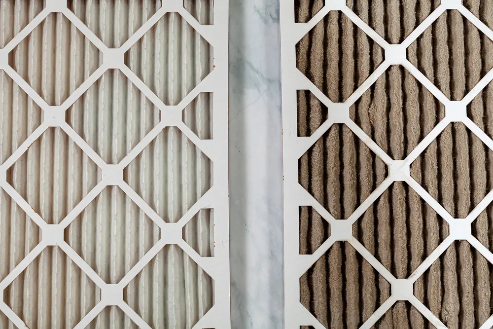 Side by side close up view of a new unused and an old heavily clogged dirty air filters. Image emphasizes the role of framed filters in improving air quality and preventing respiratory problems.